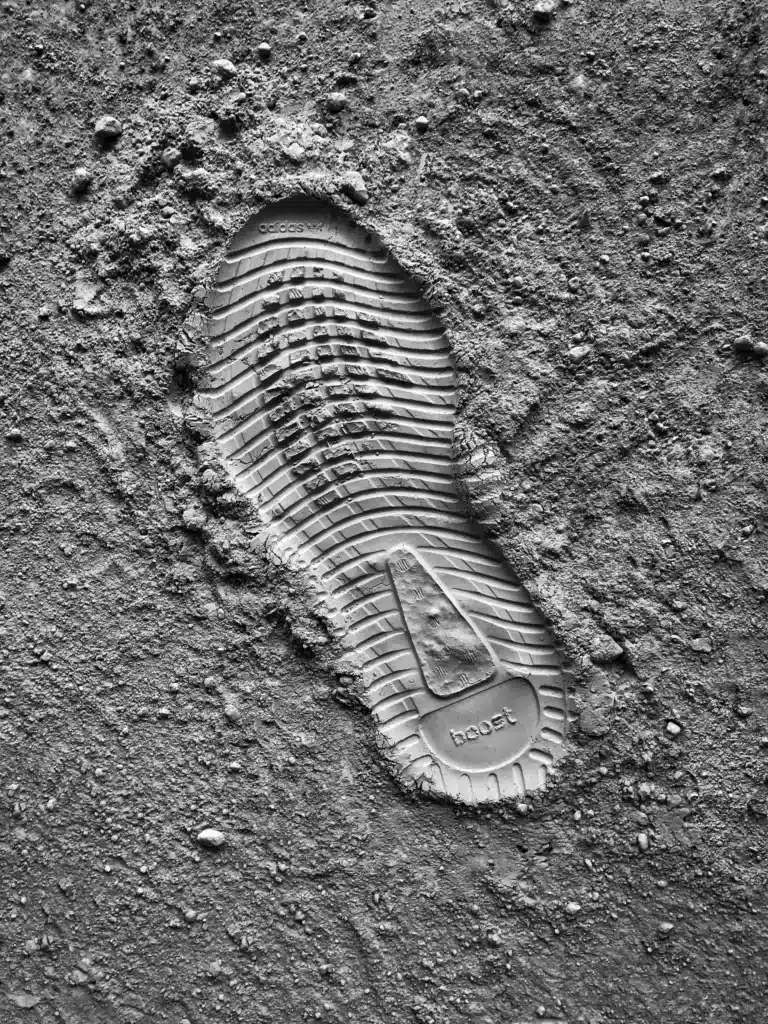 shoe’s footprint in the sand
