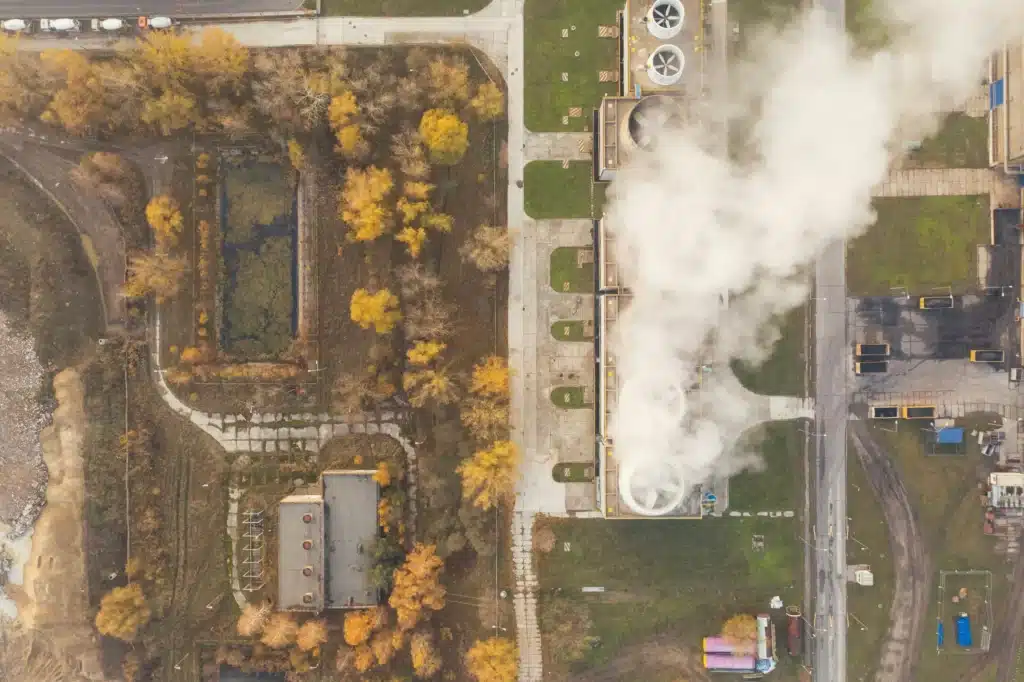 A company seen from above that needs to produce a carbon accounting.