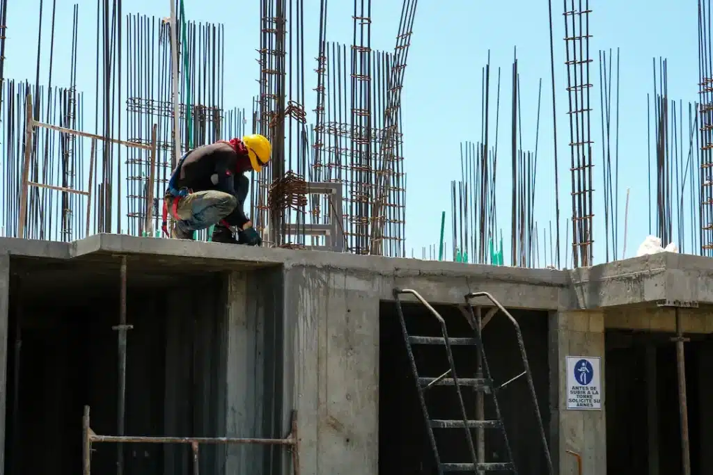 Construction worker wearing a safety harness