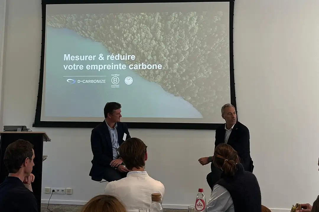 Two speakers addressing a audience at a startup seminar